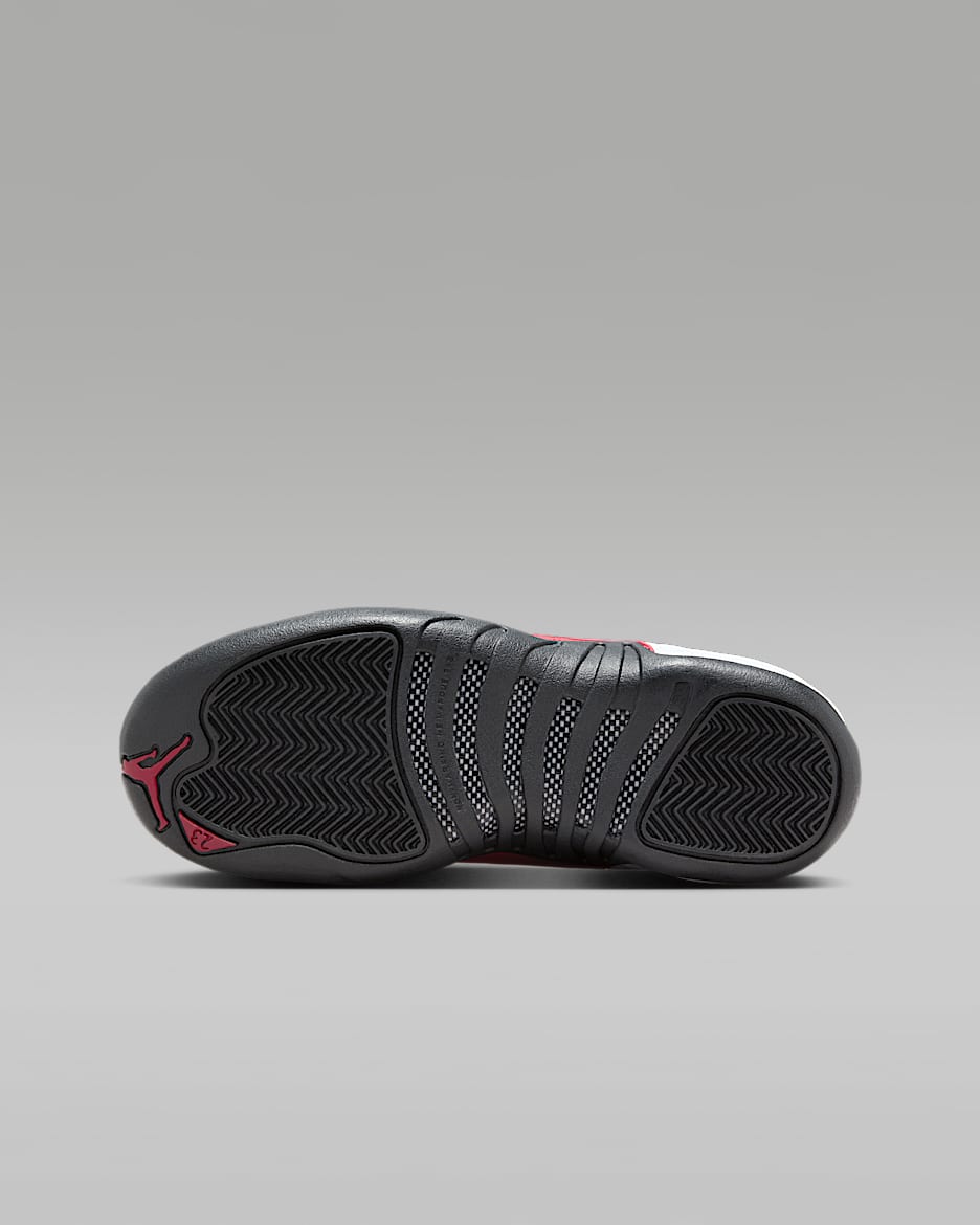 Air Jordan 12 Retro Taxi Flip Big Kids Shoes. Nike